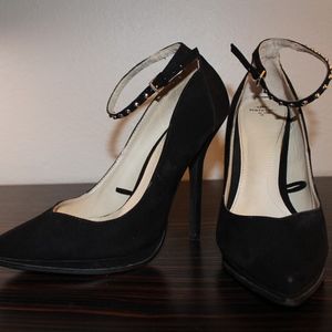 Black pumps with studded ankle strap